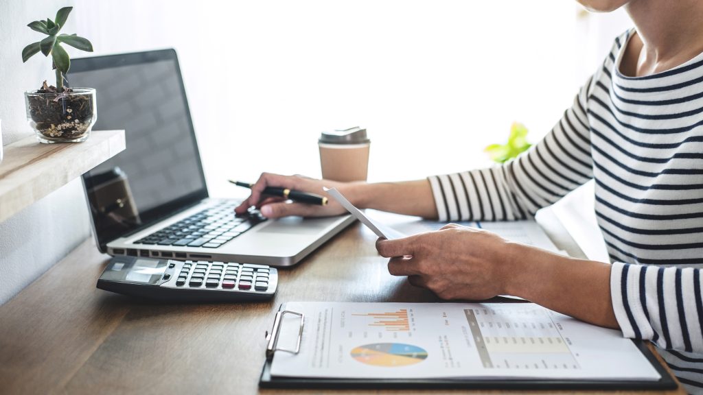 Business-owner-working-on-laptop